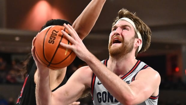 Jan 27, 2022; Spokane, Washington, USA; Gonzaga Bulldogs forward Drew Timme (2) shoots the ball against Loyola Marymount Lions forward Keli Leaupepe (34) in the second half at McCarthey Athletic Center. Gonzaga won 89-55. Mandatory Credit: James Snook-USA TODAY Sports